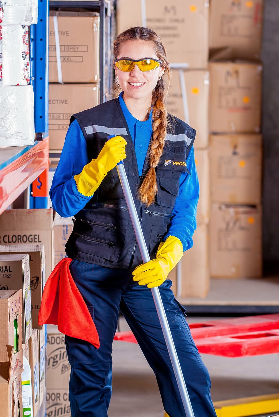 woman in blue vest wearing yellow gloves, industrial, security HD wallpaper