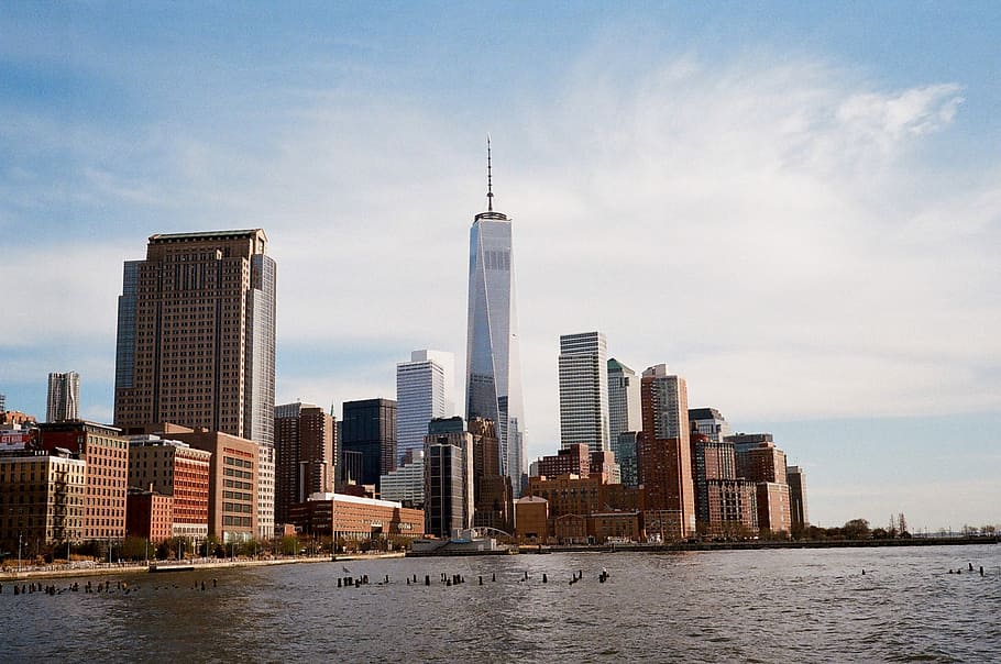 city near body of water under white and blue sky during daytime photgraphy, New York Skyline