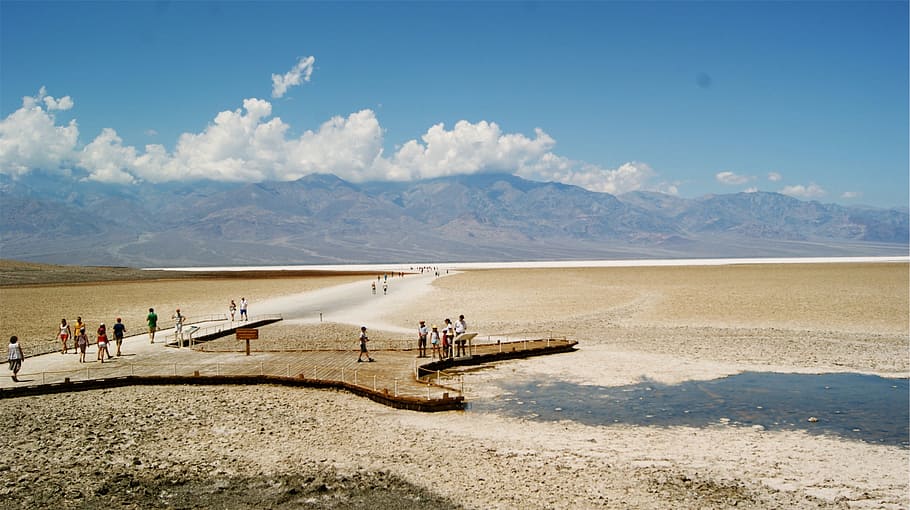 beach, sand, dry, puddles, dock, people, sunshine, sunny, mountains HD wallpaper