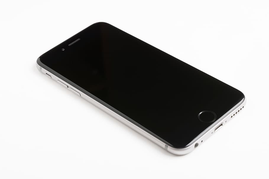 silver iPhone 6 on white surface, black, cellphone, mobile, smartphone, HD wallpaper