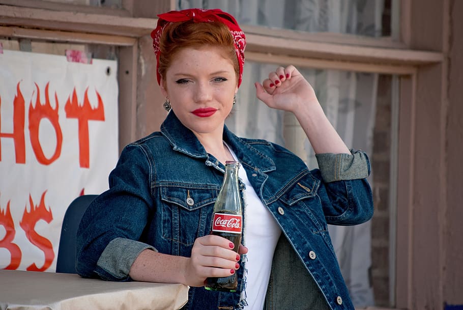 woman in blue denim jacket holding Coca-cola bottle, girl, 50's style