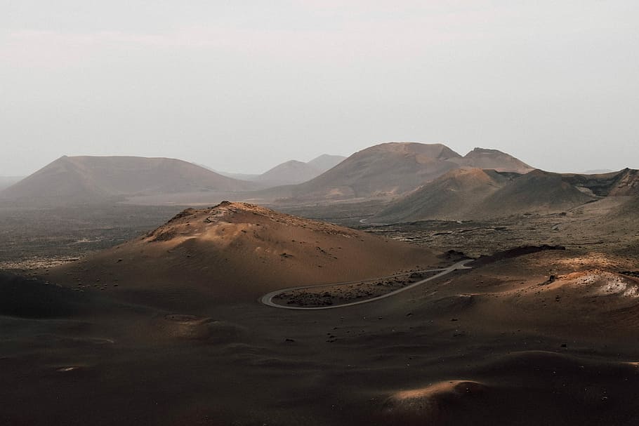 desert landscape photography, brown mountain under white cloud HD wallpaper