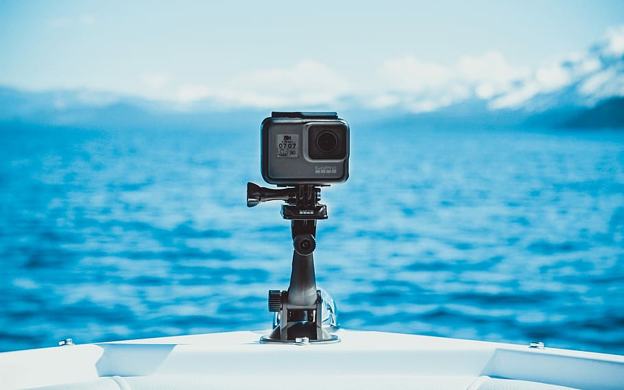 gray activity camera photography, gray and gray action camera on boat HD wallpaper