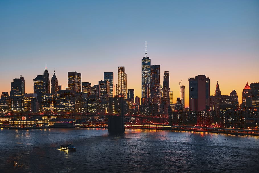 panoramic aerial photography of Brooklyn Bridge and New York city's skyline during golden hour HD wallpaper