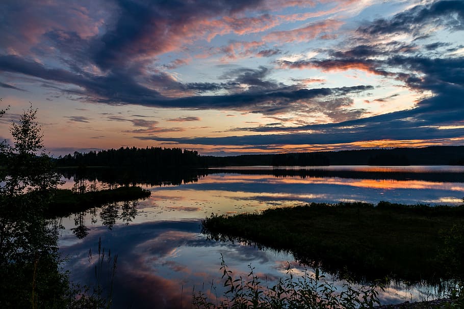 lake over multicolored cloud formation at twilight, sunset HD wallpaper