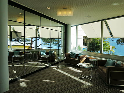 empty chairs in front of glass wall, hotel hall, mirror, sunlight HD wallpaper