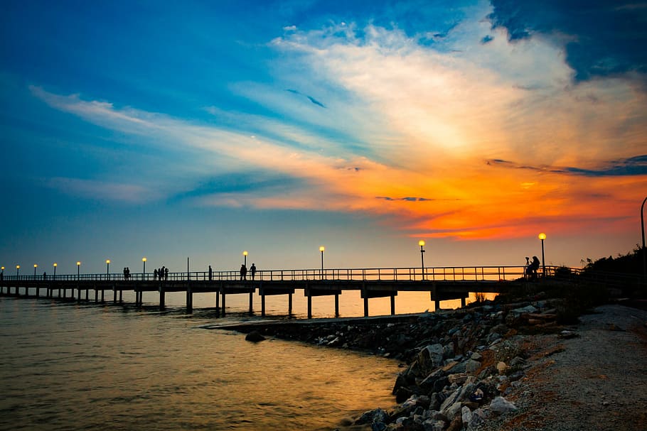 people walking on dock and golden time, sunset, water, dusk HD wallpaper