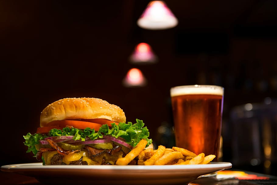 selective focus food photography of burger and fries on white ceramic plate with drinks, HD wallpaper