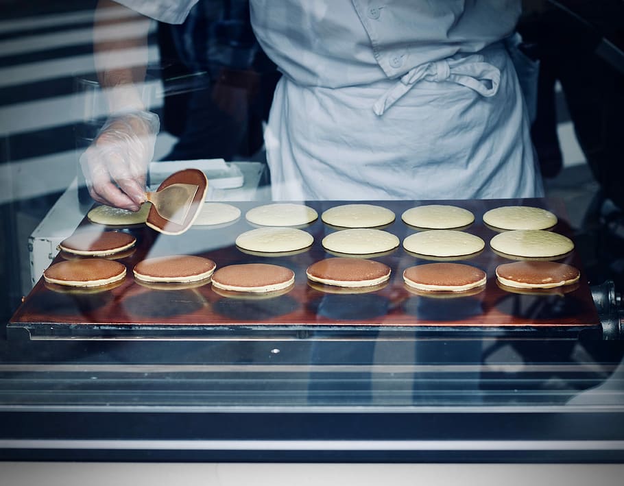 person in white apron baking flatbread, person wearing white suit baking pancakes HD wallpaper