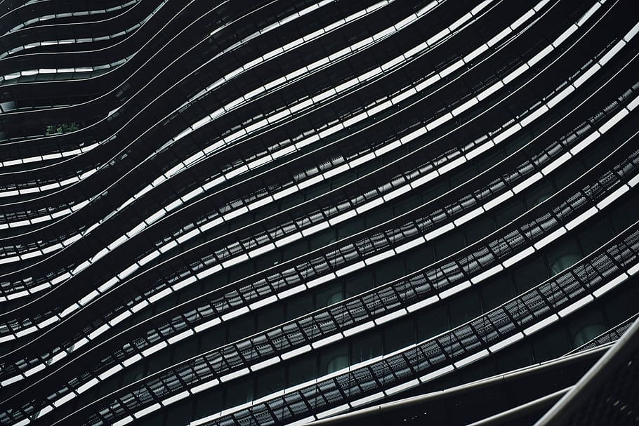 low angle photography of architectural building, black curvy building HD wallpaper