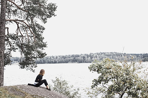 Woman Sitting on Gray Soil Near Body of Water, countryside, daylight HD wallpaper