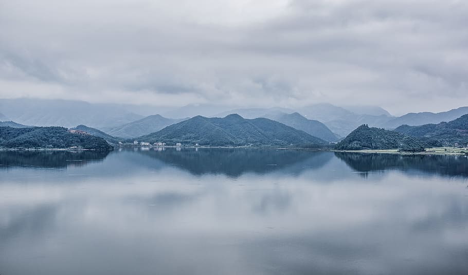 body of water near mountains at daytime, photo of body of water with islands HD wallpaper