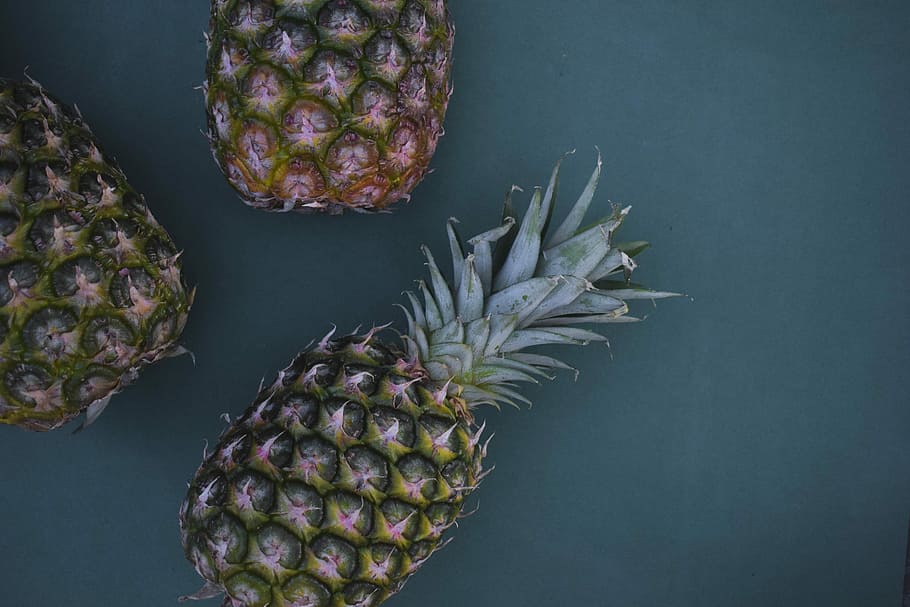 flat-lay photography of three pineapples, several green pineapples, HD wallpaper