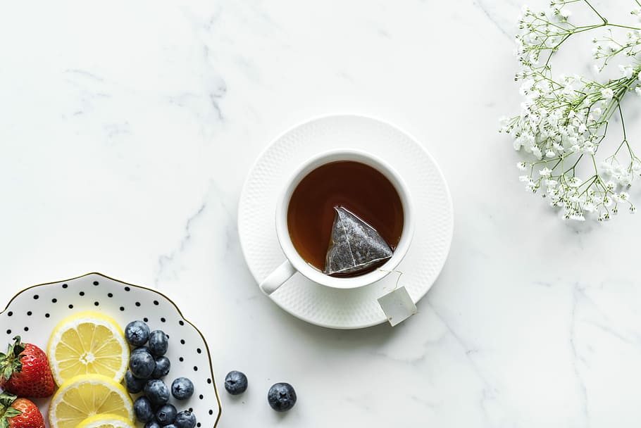 white ceramic mug on white table, tea, flatlay, fruit, flower, HD wallpaper