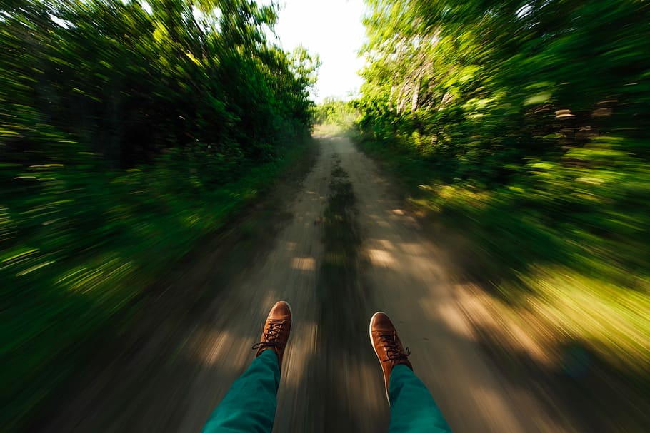 time lapse photography of person, selective focus photography of person wearing brown sneakers HD wallpaper