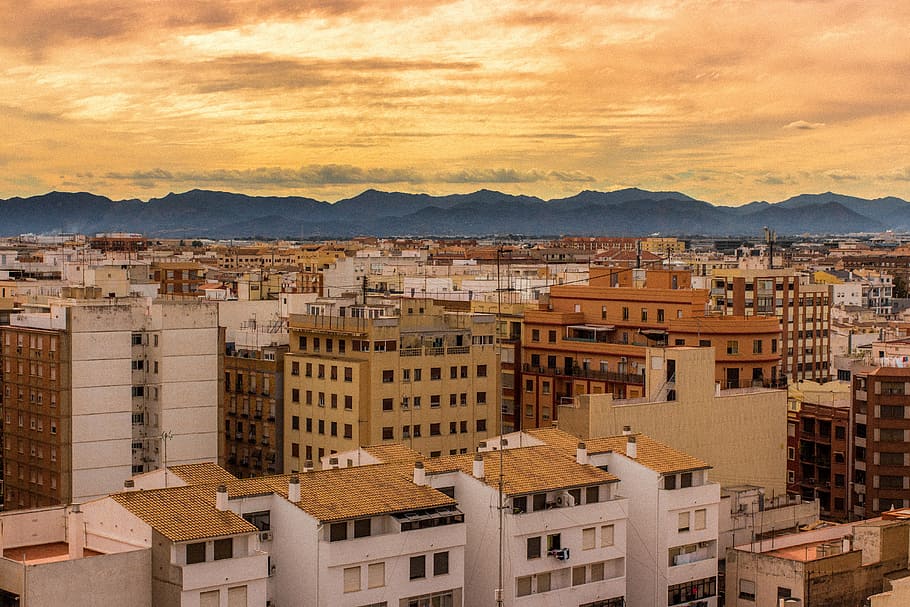 buildings, city, clouds, mountain range, sky, architecture HD wallpaper