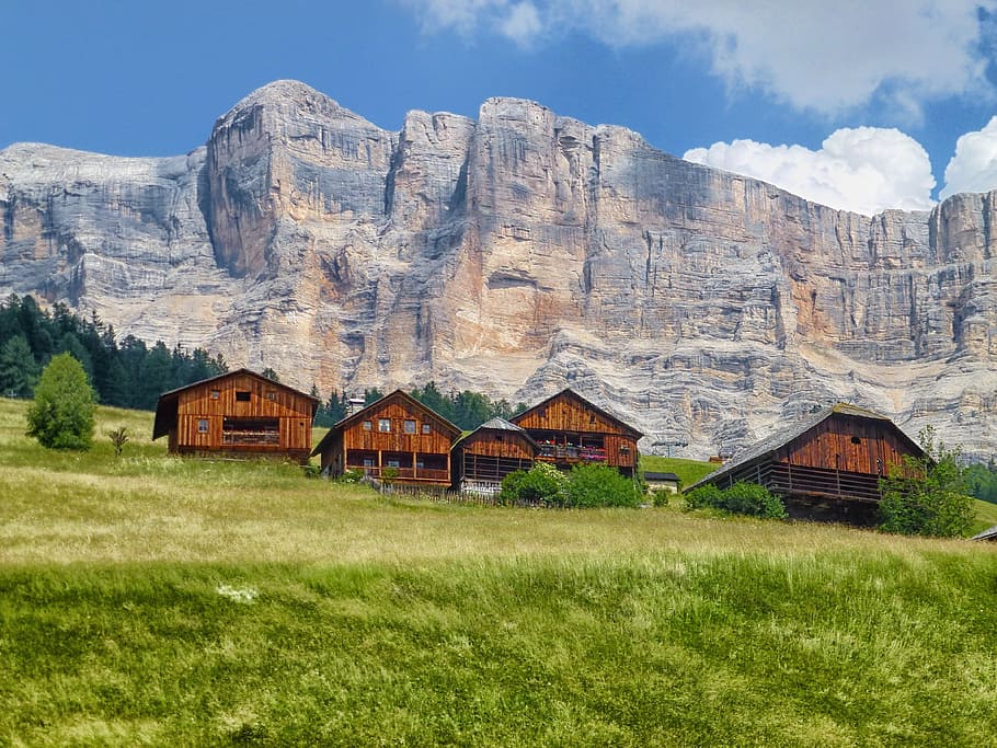 five brown wooden houses beside mountain under blue sky at daytime, HD wallpaper