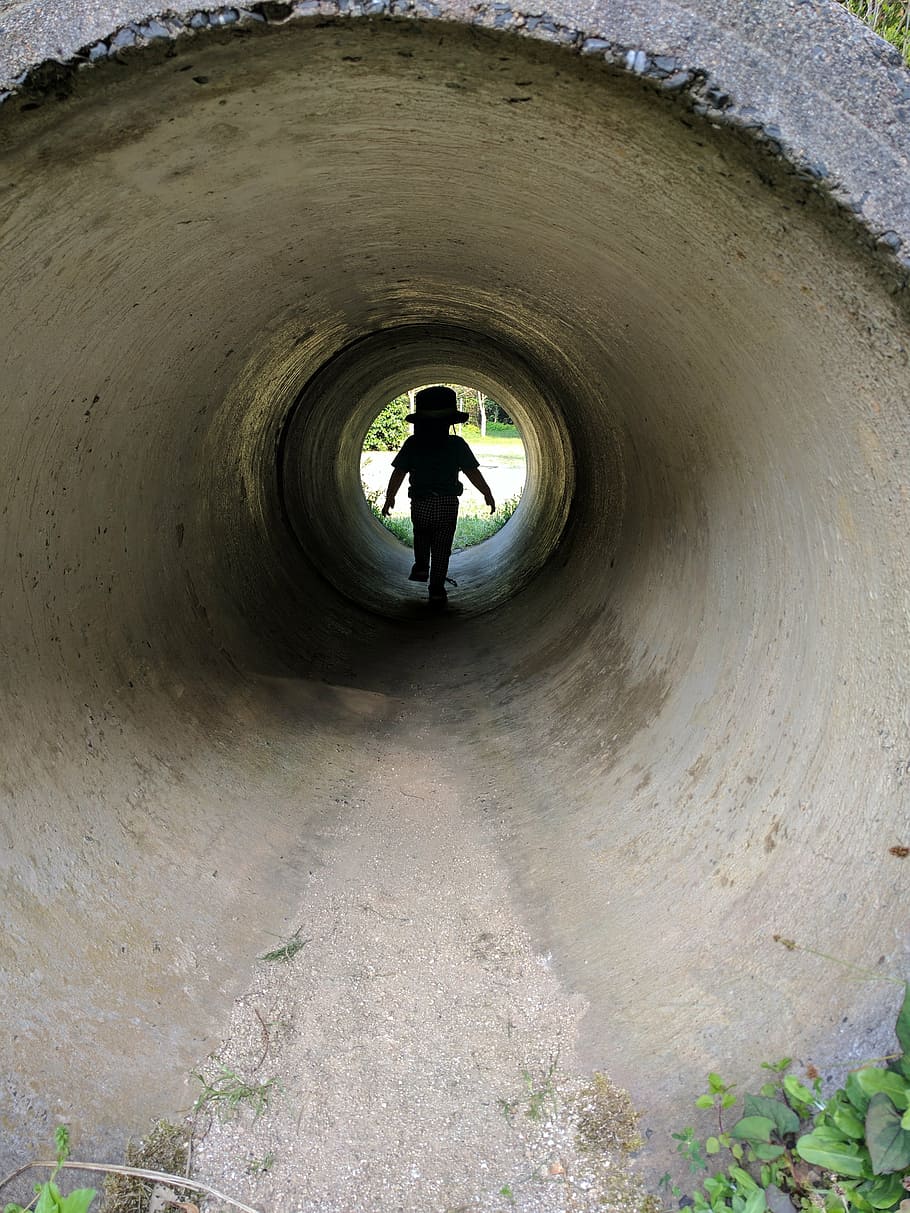 kids, tunnel, shadow, real people, lifestyles, one person, full length