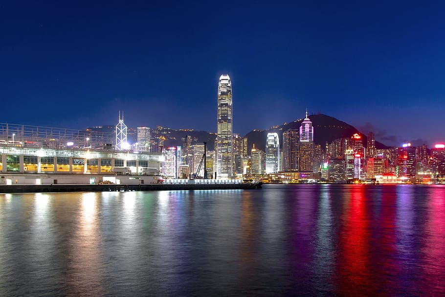 lightened city buildings near body of water at night time, night scenery HD wallpaper
