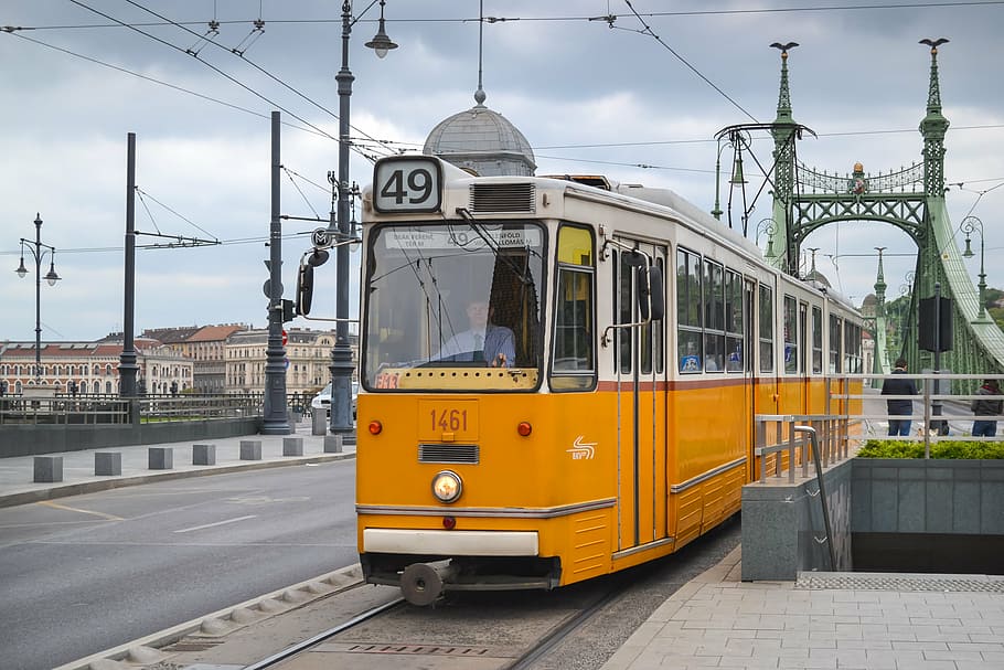 HD wallpaper: moving yellow city tram, transport, transportation