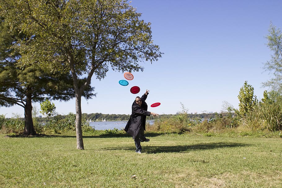frisbees, lake, stop motion, full length, plant, tree, one person HD wallpaper