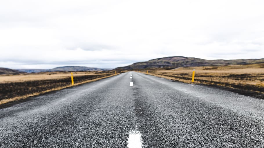 gray asphalt road photo during daytime, boardwalk near mountain HD wallpaper