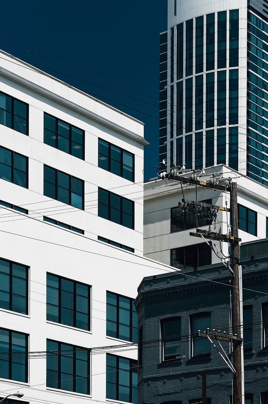 white and green building with glass windows at daytime, low-angle photography of building, HD wallpaper