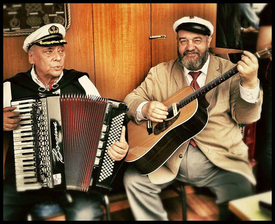two men holding instrument, schifferklavier, romantic, port, shanty