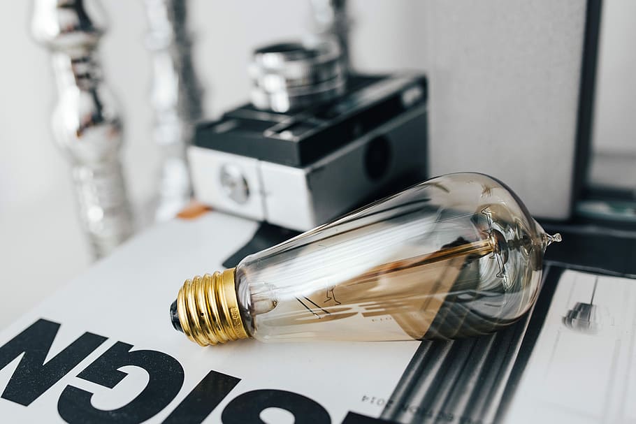 Pencils, magazines and an old lightbulb, vintage, camera, blackandwhite HD wallpaper