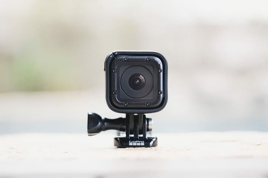 GoPro camera on white surface, action, tech, gopro4, hero, technology HD wallpaper