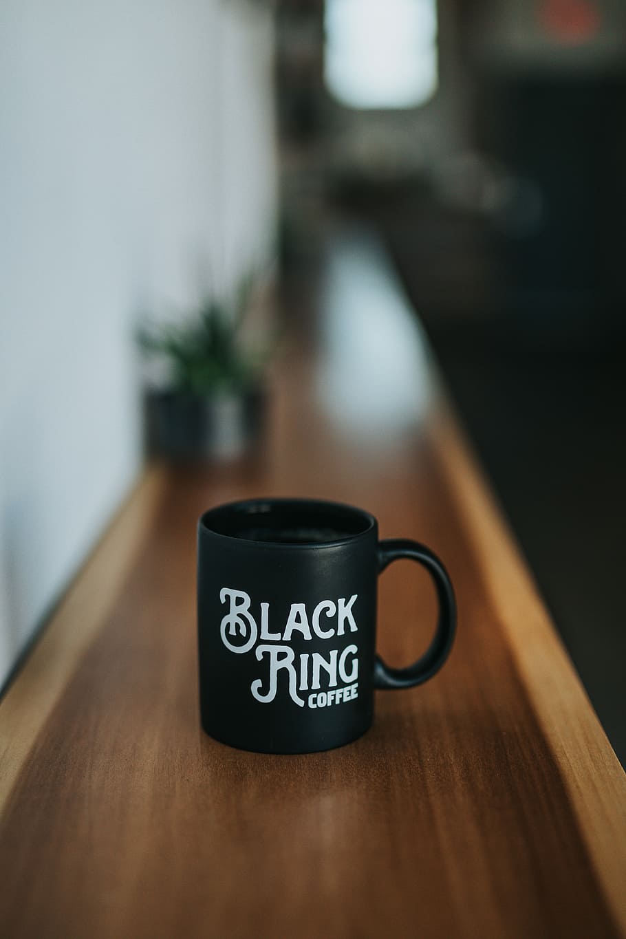 black Black Ring Coffee ceramic coffee mug on brown wooden surface, black Black Ring coffee ceramic mug on brown wooden table HD wallpaper
