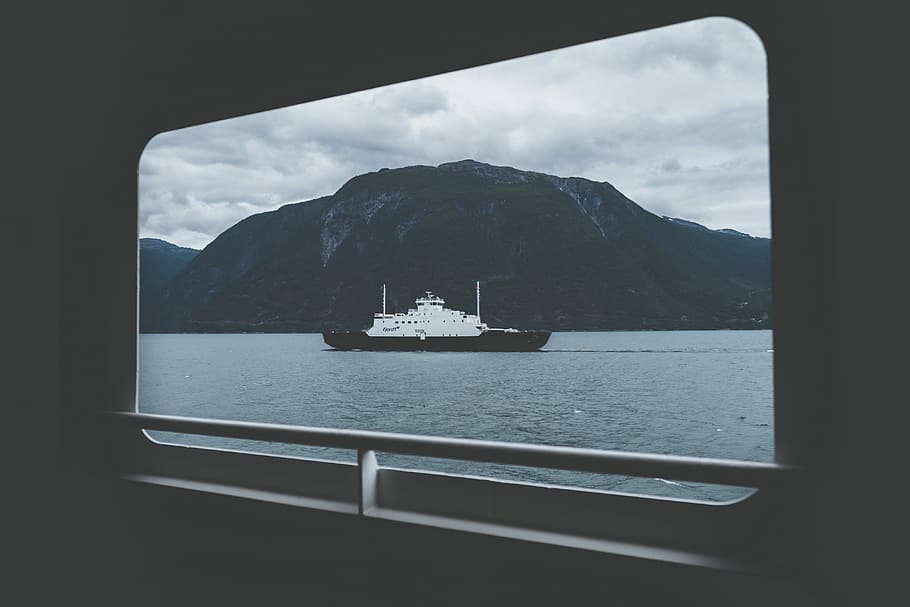 ship on body of water under gray sky during daytime, black and white ship on body of water HD wallpaper