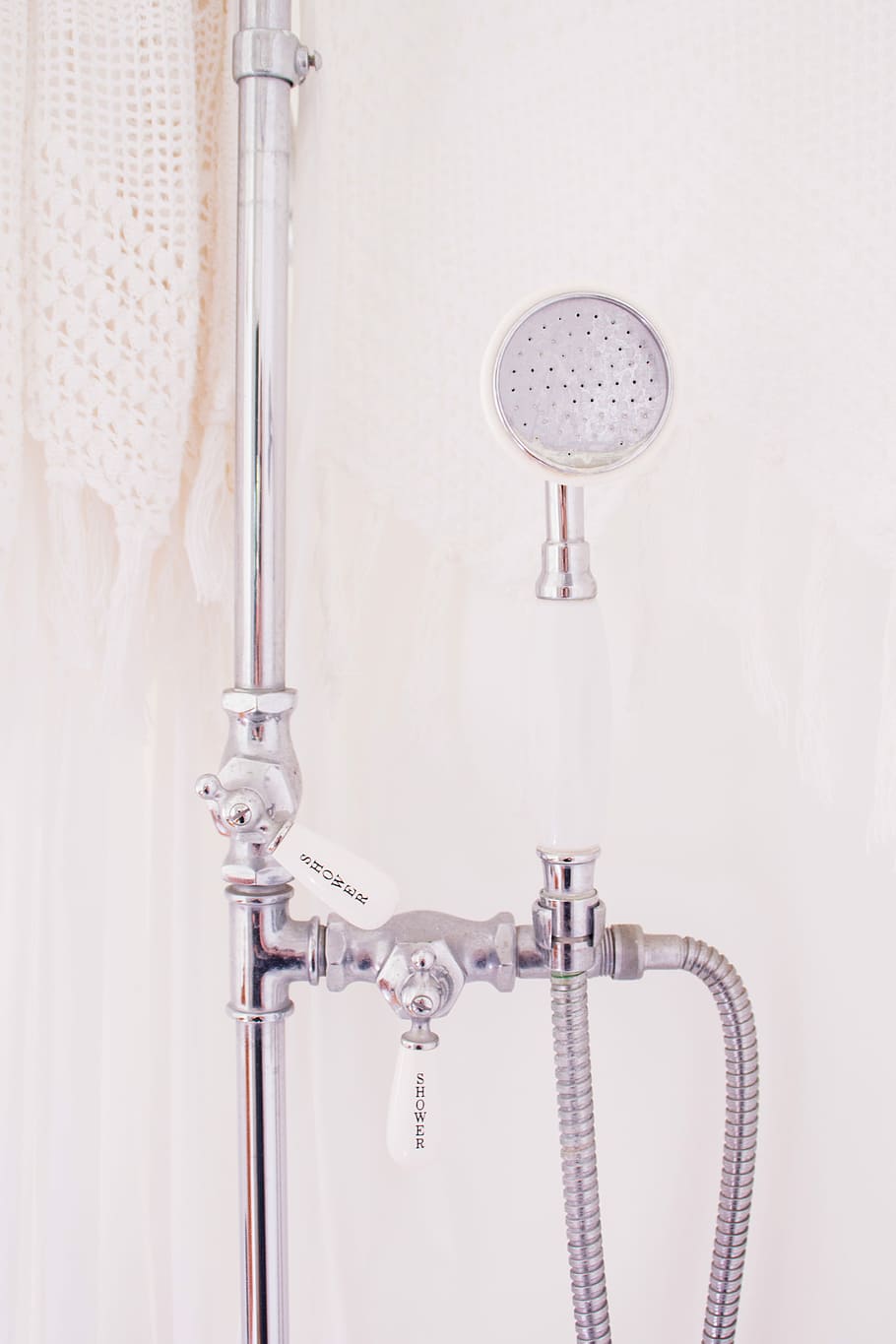 gray metal handheld shower head, assembled silver shower head HD wallpaper