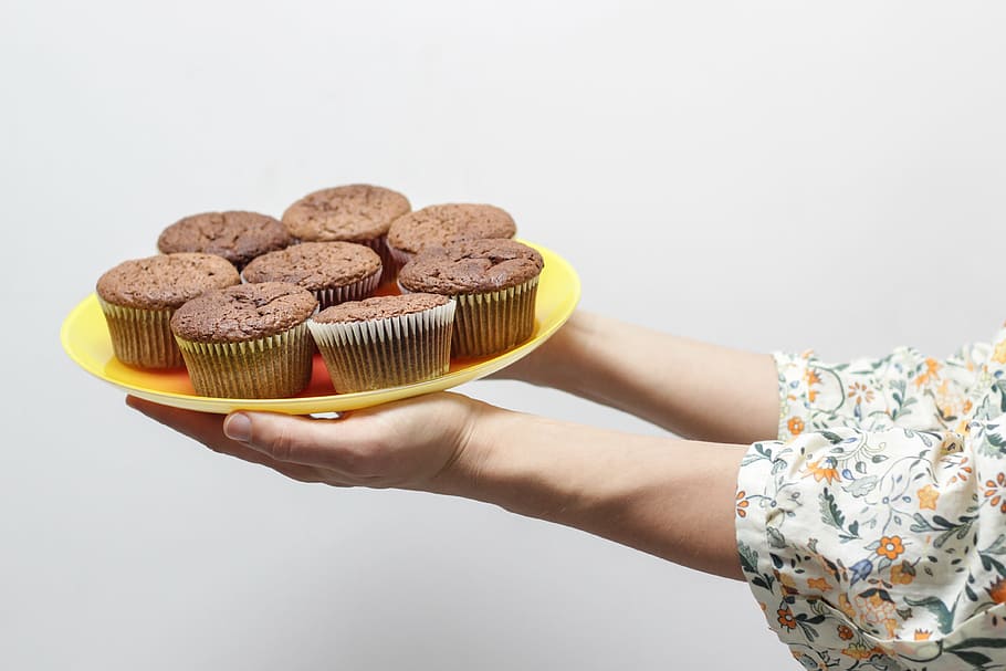 person holding chocolate cupcakes, people, hands, food, eat, styling, HD wallpaper