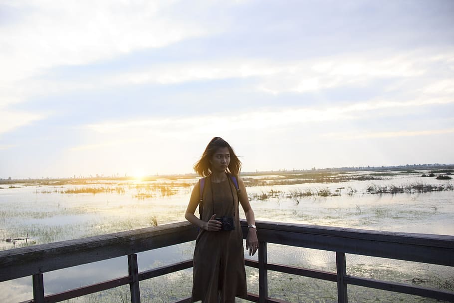 sky, sunset, person, woman, attractive, background, camera, clouds HD wallpaper