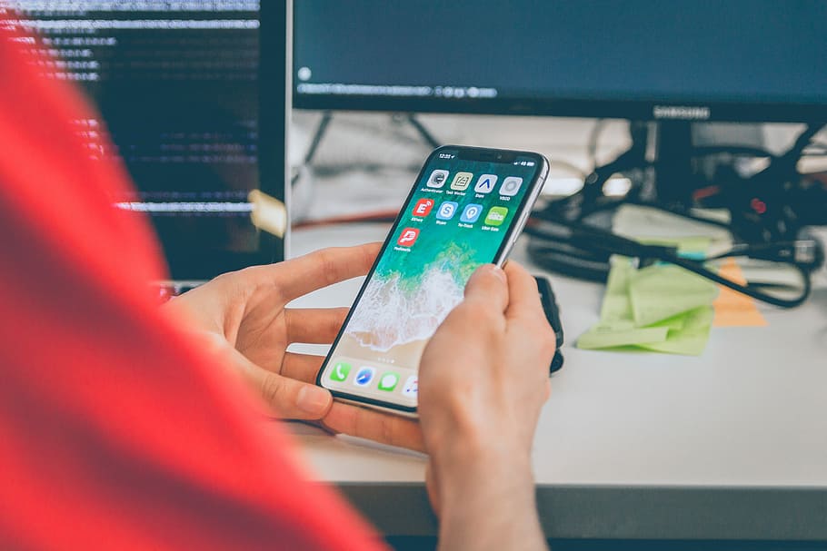 person using silver iPhone X, person holding silver iPhone X HD wallpaper