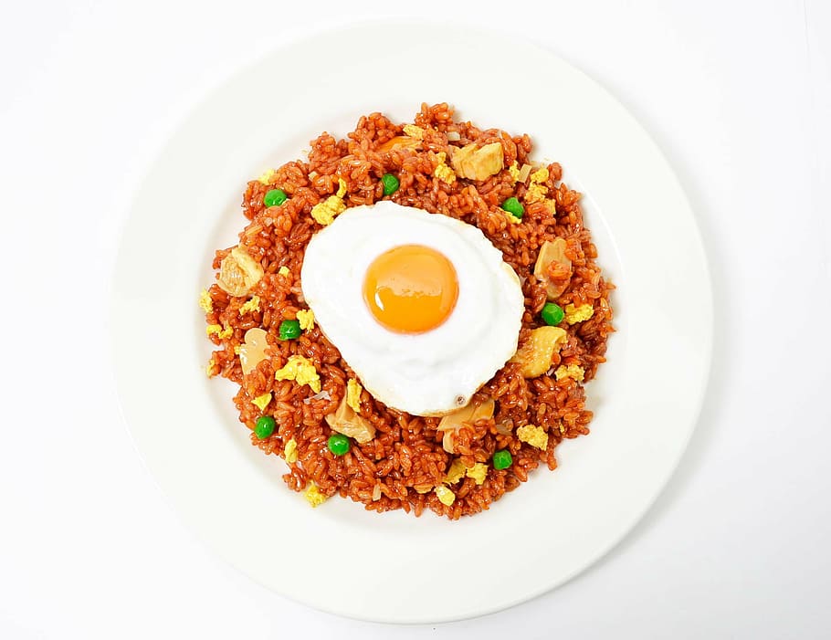 cooked food on white ceramic plate, nasi goreng, fried rice, fried egg