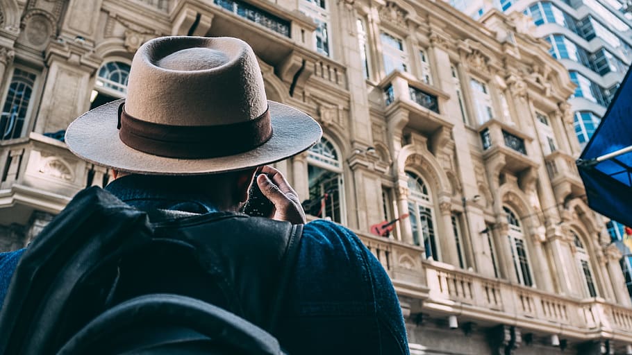 man taking picture on building, architecture, city, person HD wallpaper