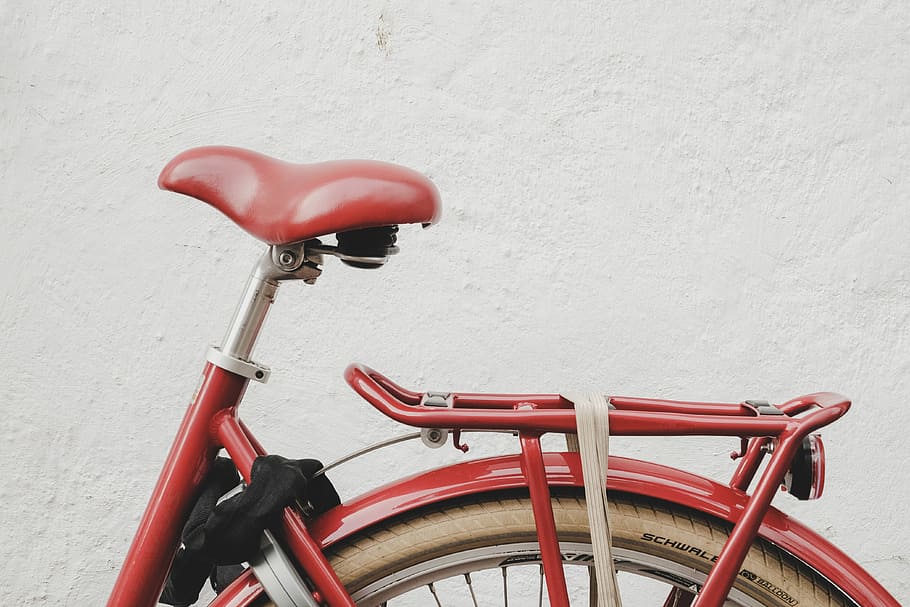 red bicycle near white wall, shallow focus photography of red dutch bike HD wallpaper
