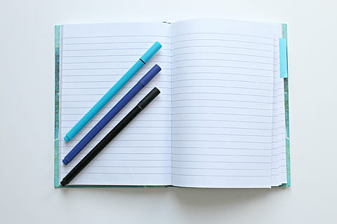 three color pens on top of notebook, notes, leave, diary, office HD wallpaper
