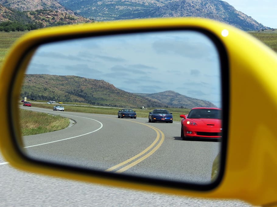 five assorted-color sports vehicles reflecting in side mirror HD wallpaper