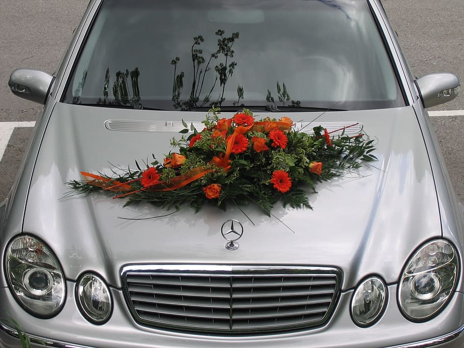 red flower arrangement on silver Mercedes Benz car, flowers, floral arrangement