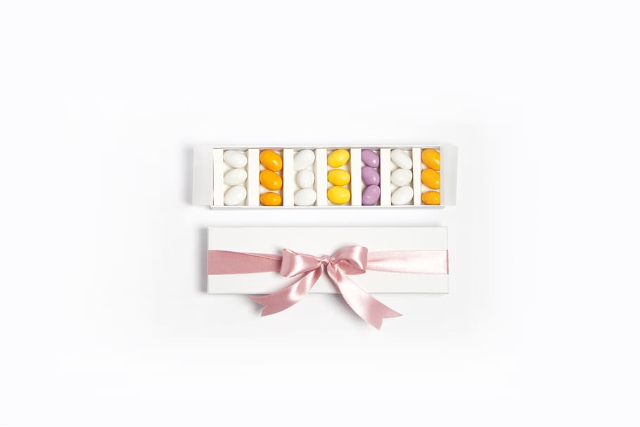 confetti, cocoa, packaging, white background, studio shot, indoors HD wallpaper