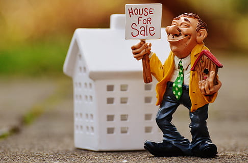 HD wallpaper: ceramic man holding house for sale figurine, real estate  agents | Wallpaper Flare