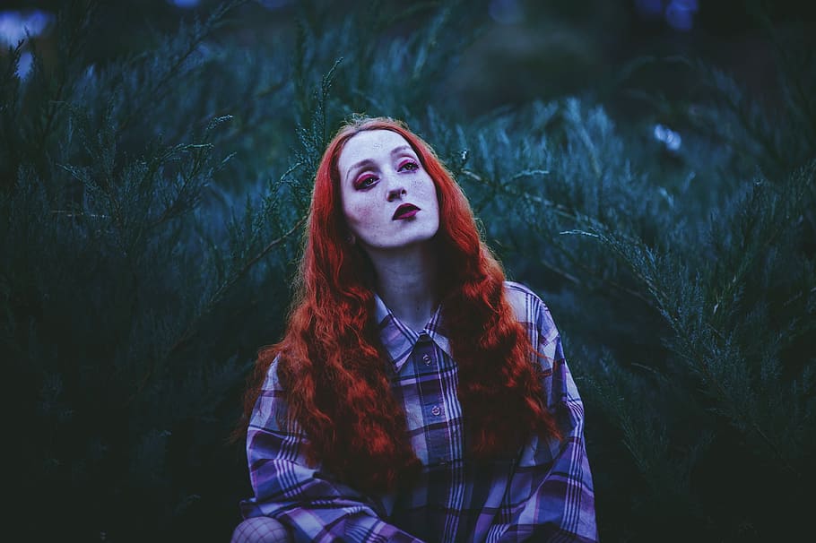 photography of red-haired woman standing near leafed plants, red hair woman standing in front of green grass HD wallpaper