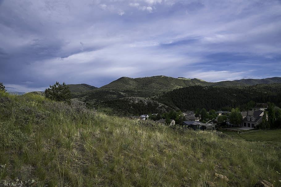 Mountain grasses landscape with hills with clouds and sky in Helena HD wallpaper