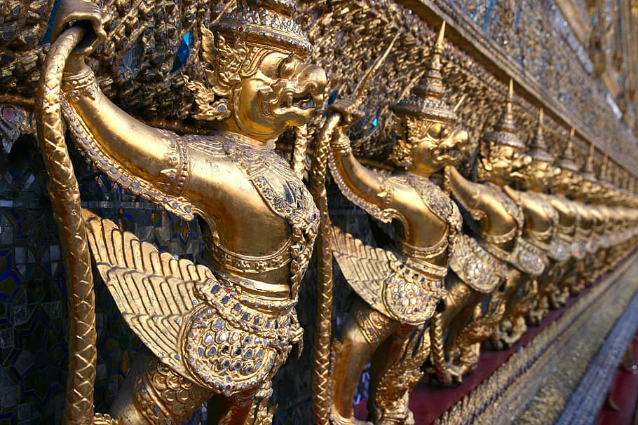 photo of brown metal statues, demons, pattern, repeat, perspective HD wallpaper