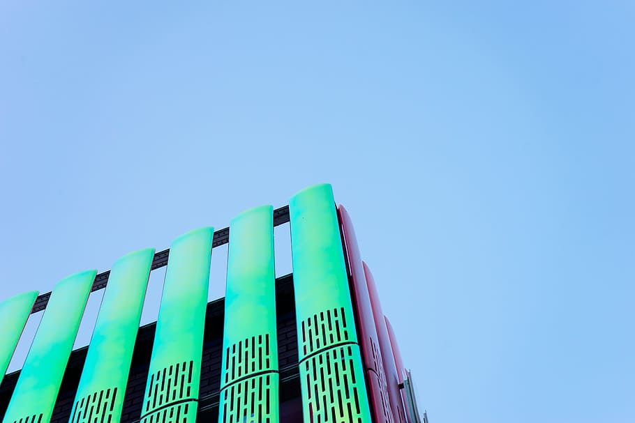 low angle photo of building, landscape photography of green and pink high rise building
