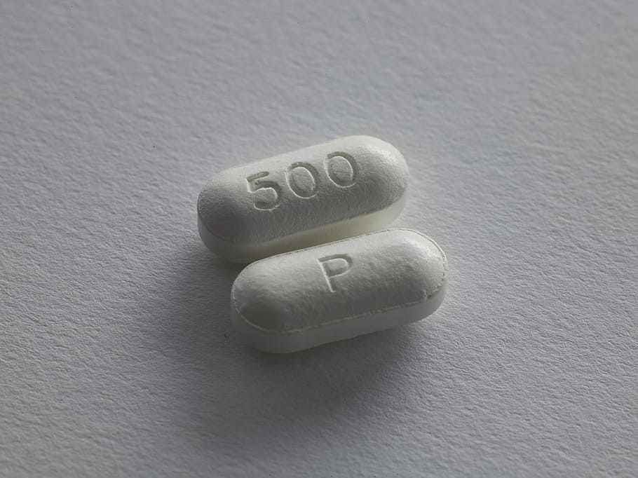 two white tablets, two white caplets, dose, pill, medicine, text HD wallpaper