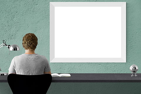 person sitting on black chair in front of desk, mockup, wall HD wallpaper